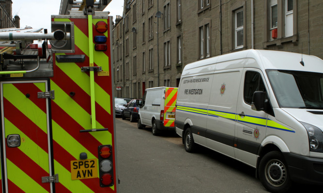 Emergency services vehicles in Park Avenue in Dundee after the fire.