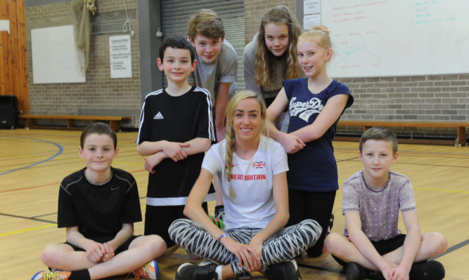 From left: Aiden Hutton, Lewis Hutton, Liam Adam, Bobbi Drysdale, Karrigan Bruce and Jack Cooper with Eilish.