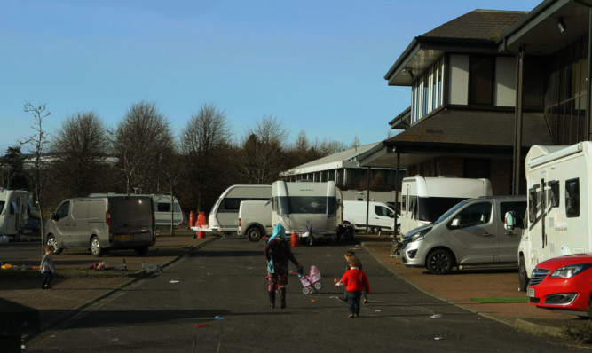 Travellers who camped on land at Dundee Technology Park.