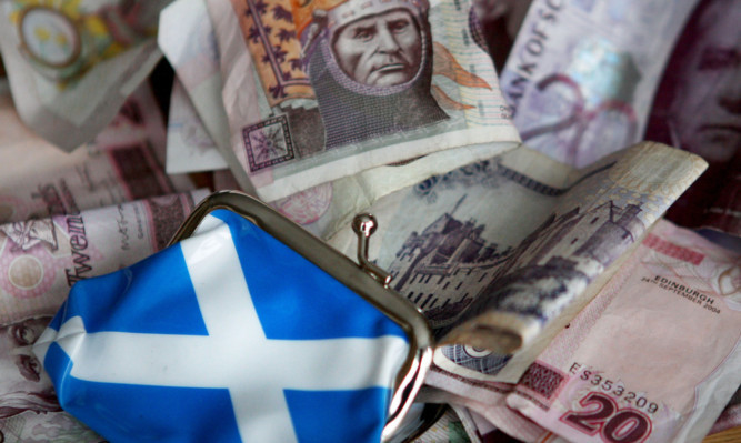 Scotlands economy has outperformed the UK  as a whole, according to a bank report.