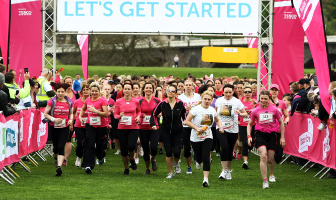 The racers stream away from the start of Perth's Race for Life.