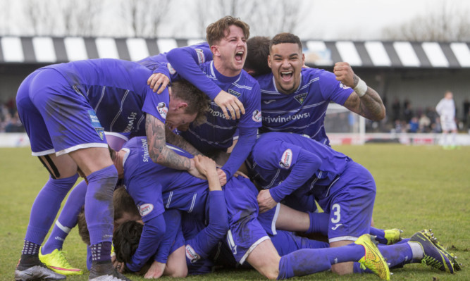 Dunfermline celebrate on another good day for the club.