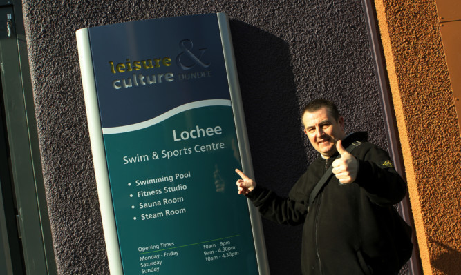 First customer of the newly opened Lochee Swim & Sports Centre John Ramsay gives a thumbs up after the revamp.