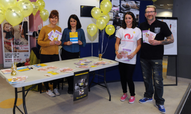 Ambassador for Endometriosis UK Claire Watson with 

Hannah Raine, Marie Penman, and Scott Smith at Victoria Hospital.