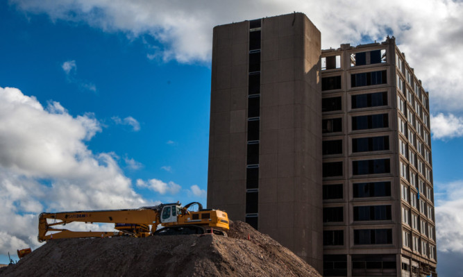 Safedem's high reach demolition machine is in place and ready to finish off the remaining floors of Tayside House.