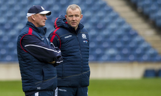 Scotland head coach Vern Cotter and breakdown coach Richie Gray at yesterday's training session.