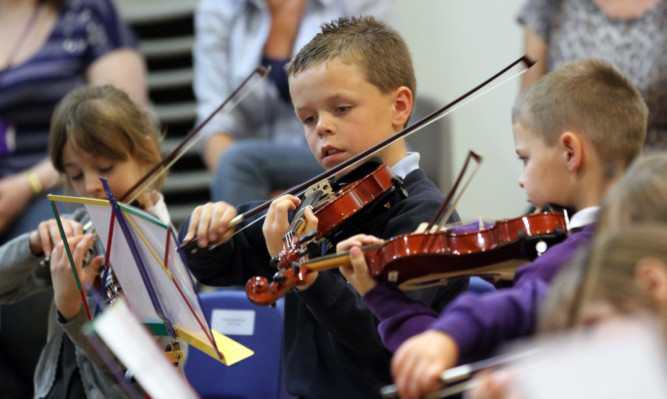 The Big Noise Raploch Orchestra is run by the charity Sistema Scotland.
