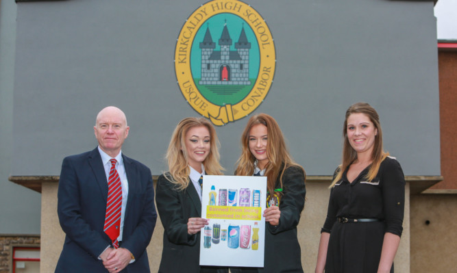 Kirkcaldy High School rector Derek Allan, pupils Victoria Mitchell and Bethany Cunningham and teacher for health and wellbeing Vicky Mitchell.