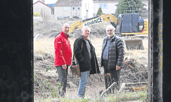 From left, Tayport Community Trust members, Mike Burns, Tony Gowland and Peter Kennedy with the land which is to be prepared for the development of the Community Hub.