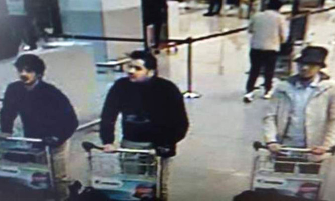 A picture of three men suspected of carrying out the bombing at Zaventem Airport has been issued by Belgian police.