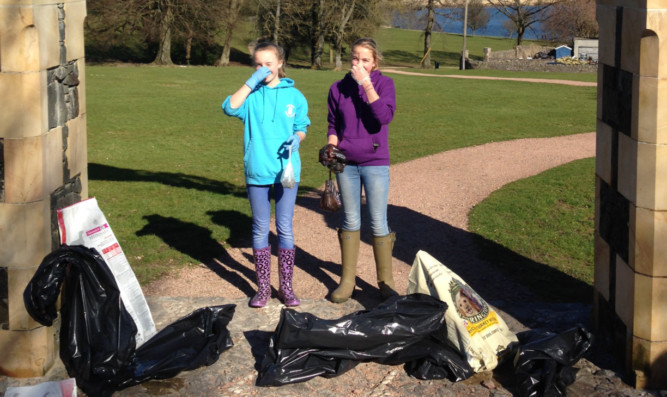 Monique Isard and Keira Brown, both 12-years-old and among the groups youngest helpers.