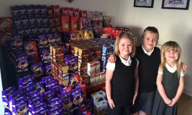 Alex, Derryn and Jorgie with the incredible Easter egg collection.