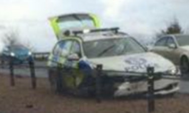 The police car slid into the central reservation barrier on the A9.