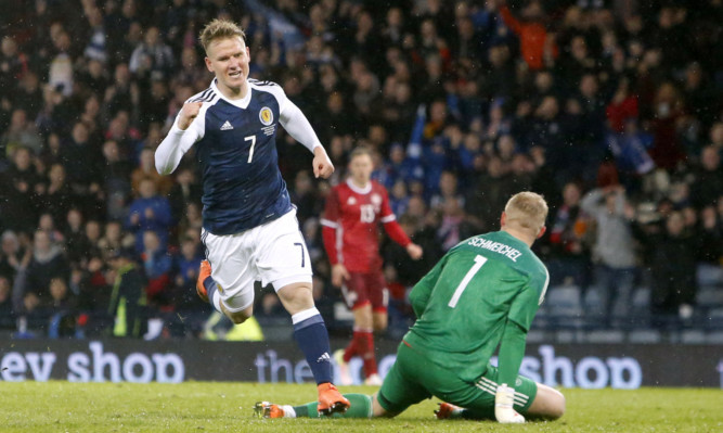 Matt Ritchie celebrates scoring for Scotland.