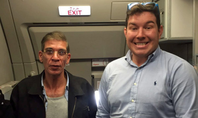 Ben Innes posed with Seif Eddin Mustafa on board the plane.