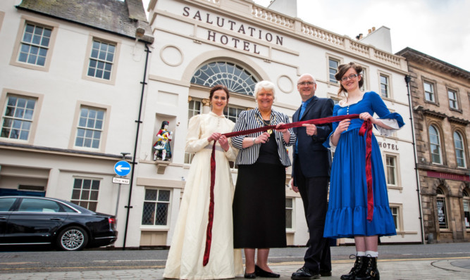 Amy MacDonald, left, and Emma-Louise Cragg, right, from the AdLib Theatre, with Provost Liz Grant and general manager Gordon Paterson.