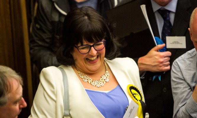 Lynne Short celebrates her win.