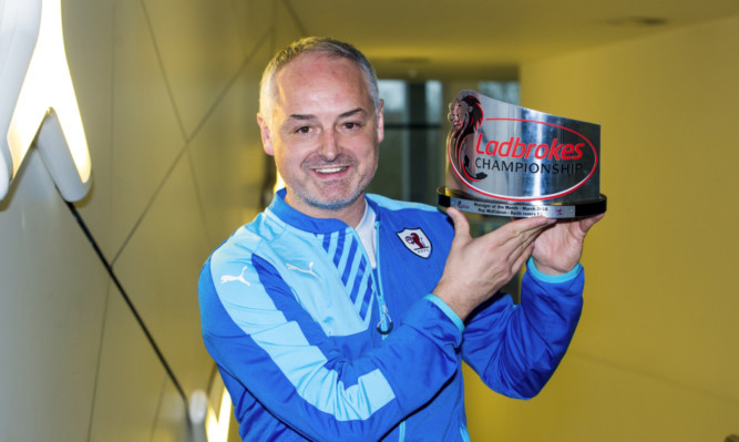 Ray McKinnon receives the Ladbrokes Championship Manager of the Month Award for March.