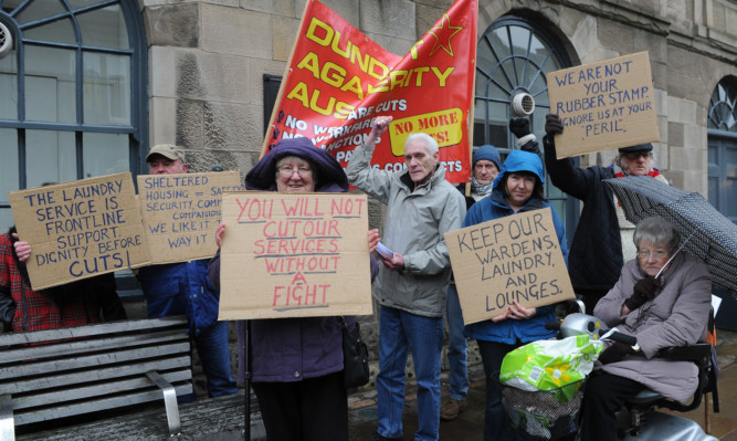 Service users have protested against changes to tenancy support officers in Angus.