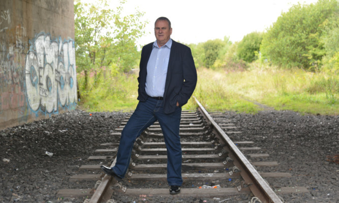 Campaigner Ross Bennett at the disused railway in Leven.