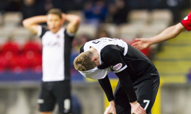 Dundee United's Billy Mckay shows his despair.