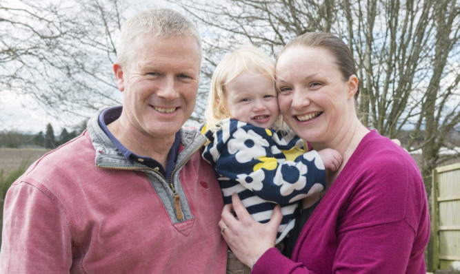 Alison and Ewan Cameron with their daughter Marnie.