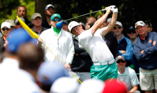 Rory McIlroy drives from the seventh tee during the final practice round at Augusta National.