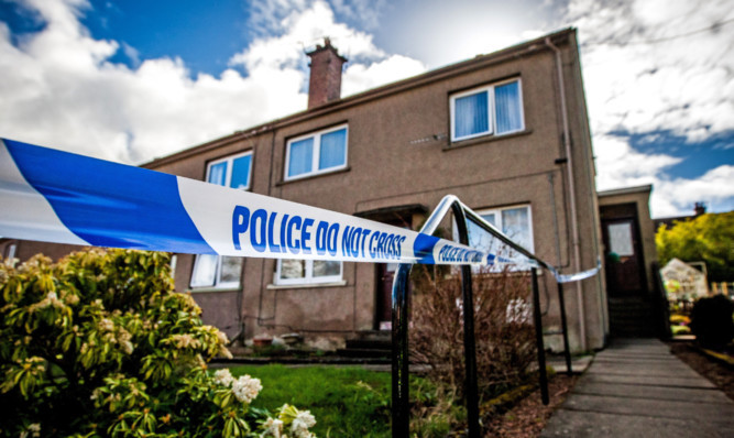 Logie Crescent remained taped off by police yesterday after the horrific incident on Tuesday.