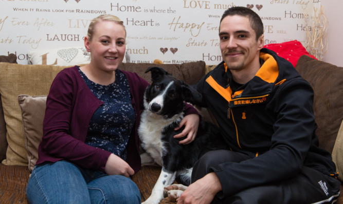 Laura Annan and Michael Thomson with Ollie.