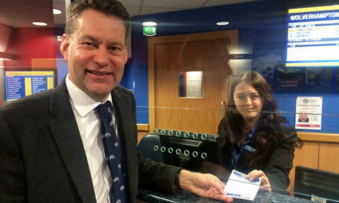 Murdo Fraser placing the bet.