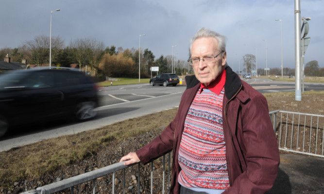 Mr Page beside the accident blackspot that is the Balfarg junction.