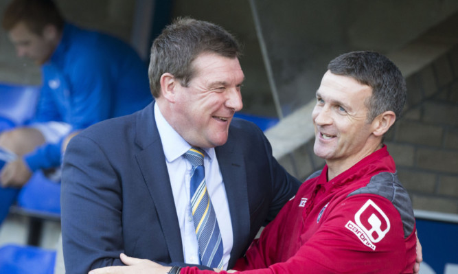Two managers happy with their league positions - Tommy Wright and Jim McIntyre.
