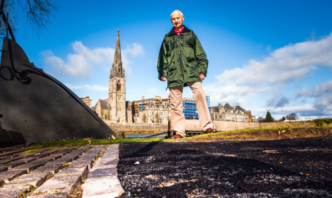 Norman Renfrew on the repaired stretch of Norie-Miller Walk.