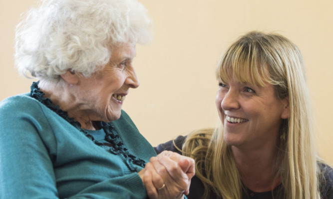 Manager Debi Wallace chats to Tilda Cavanaho who was celebrating her 93rd birthday at the centre on Friday.