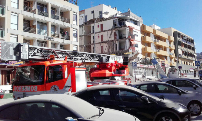 Emergency services at the scene following the collapse of a four-storey building in Los Cristianos, Tenerife.