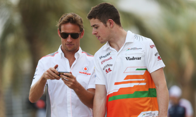 Paul Di Resta, right, with Jenson Button, who finished behind the Scot again.