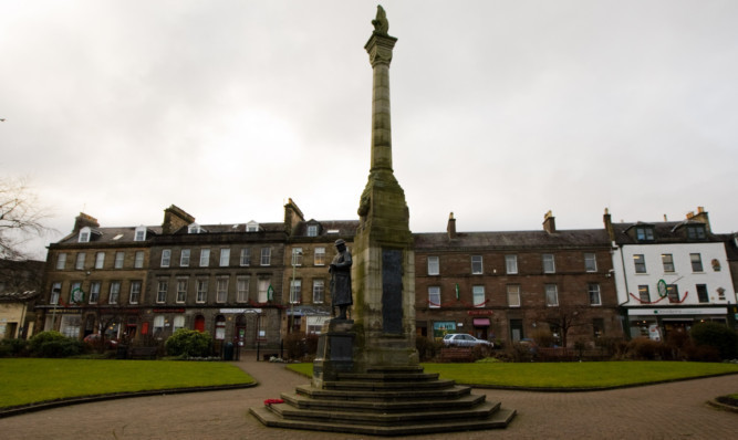 The Wellmeadow in Blairgowrie, with the war memorial in the foreground.