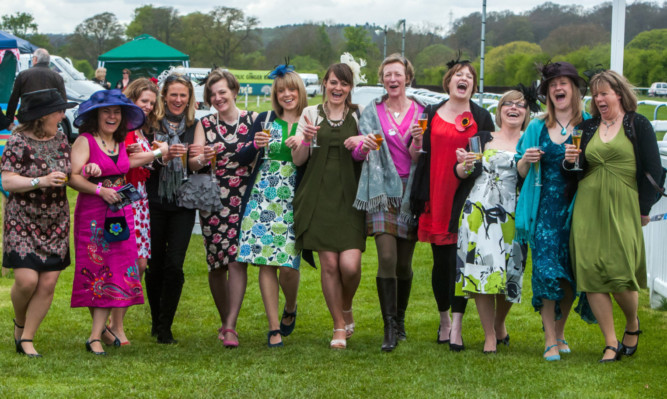 Kirsty Baird (centre, in dark green) celebrating her 40th birthday with Abernethy friends.