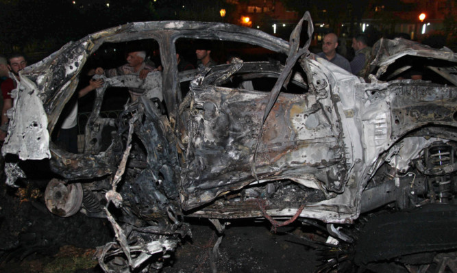 The site of a car bomb in Damascus.