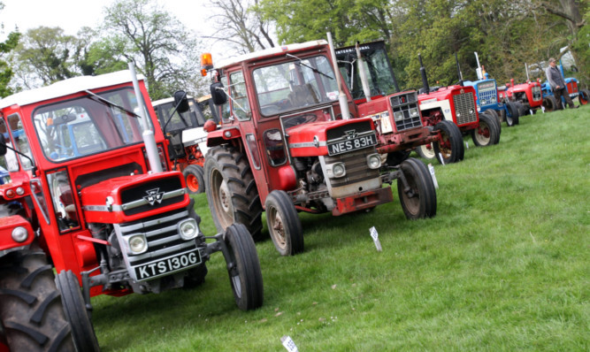 Kris Miller, Courier, 18/05/13. Picture today at the Fife show near Cupar shows some of the vintage tractors.