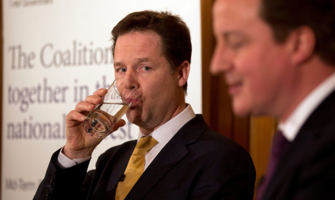 Deputy Prime Minister Nick Clegg and Prime Minister David Cameron during the launch of the mid-term review in London in January.
