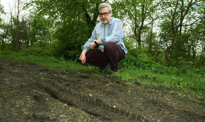 Iain Johnston at the Den in Cardenden beside some of the tracks made by the off-road bikes.