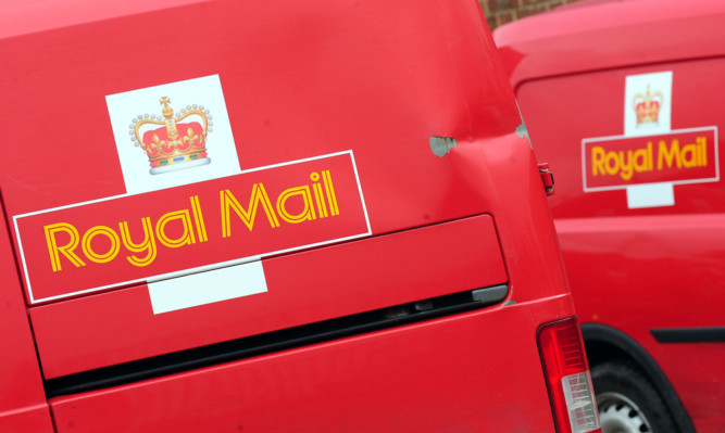 General view of Royal Mail vans at Swadlincote Post Office, Derbyshire. PRESS ASSOCIATION Photo. Picture date: Tuesday May 21, 2013. See PA story CONSUMER Post Office. Photo credit should read: Rui Vieira/PA Wire