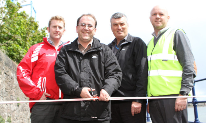 Graeme Brown of Sustrans, Mr Dawson, council engineer Martin Lorimer, Kilmac construction director Richard Kilcullen.