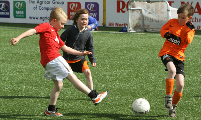 Some of the children who took part in the P3/4 football festival at Station Park in Forfar.