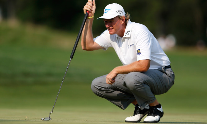 Ernie Els has found success with the belly putter but is confident he can switch back.