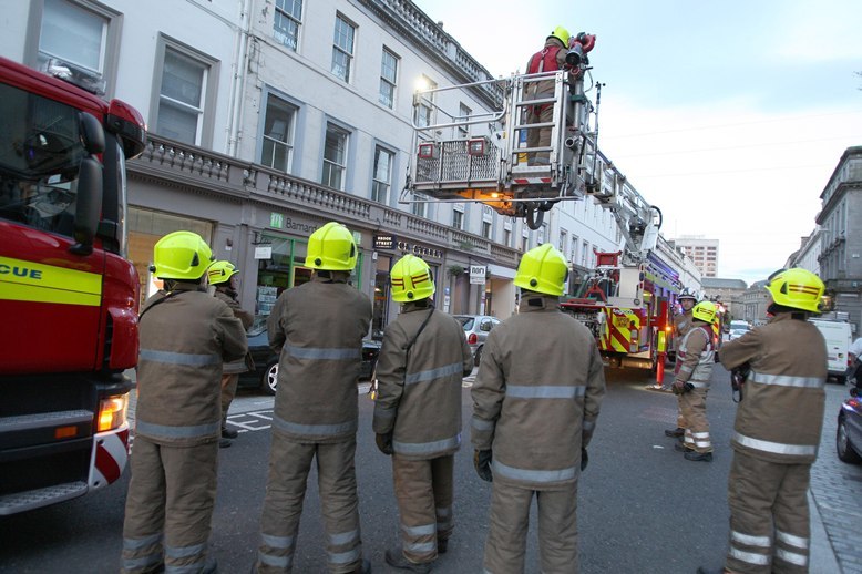 Kris Miller, Courier, 27/07/10, News. Picture today at Reform Street, Dundee. Pic shows firefighters at the scene of malicious fire in block in Reform Street.