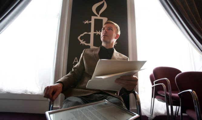 Campaigner David Grimason gives a speech in Edinburgh.