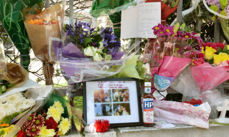 Tributes left to Drummer Lee Rigby at the scene of last week's killing.