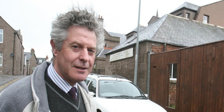Douglas Murray at his gate to his premises in Bank Street, Brechin.